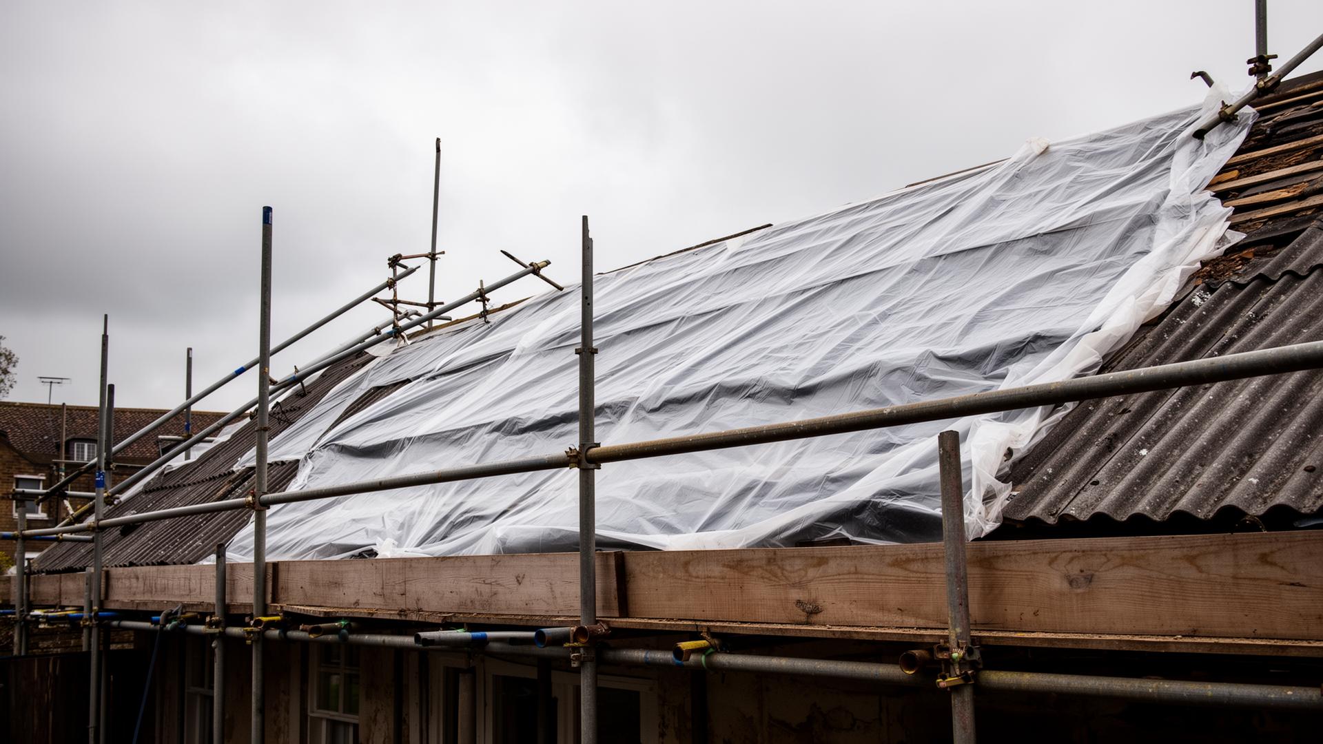 Temporary roof, listed building